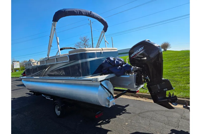 Slide: The Image of 2020 Avalon Venture Cruise Bow Fish pontoon boat with Mercury outboard motor on trailer. - 3