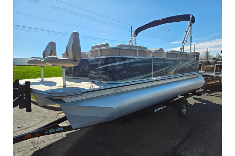Slide: The Image of 2020 Avalon Venture Cruise Bow Fish pontoon boat on trailer, side view. - 5