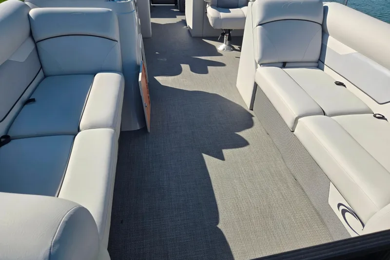 Slide: The Image of Interior of 2022 Crest Classic LX 220 SLRC pontoon boat with spacious seating. - 10