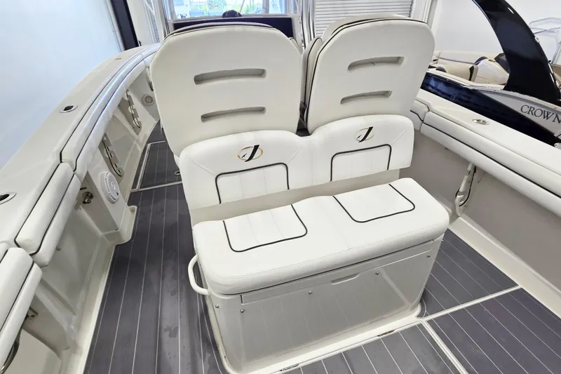 Slide: The Image of 2017 Jupiter 30 HFS boat interior with white cushioned seating and sleek design. - 10