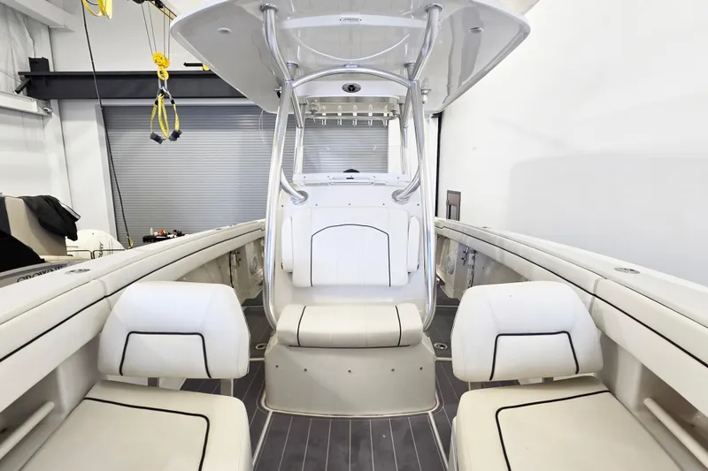 Slide: The Image of 2017 Jupiter 30 HFS boat interior with white seating and sleek design. - 7