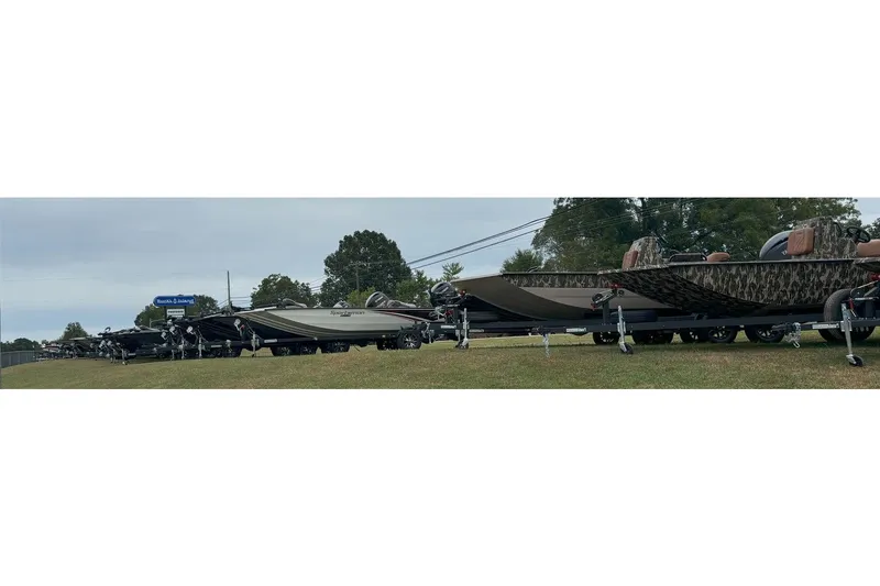 Slide: The Image of 2024 G3 Gator Tough 18 DK boats parked in a lot. - 11