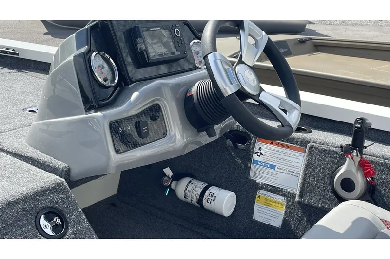 Slide: The Image of Interior view of 2023 G3 Sportsman 1710 boat with steering console. - 6