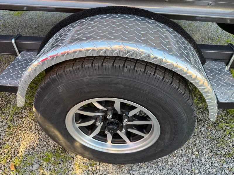 Slide: The Image of Close-up of tire with diamond plate fender, G3 Angler V 178 F 2026. - 17