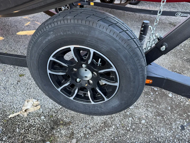 Slide: The Image of Close-up of a tire on G3 SPORTSMAN 1710 SC boat trailer, year 2026. - 17