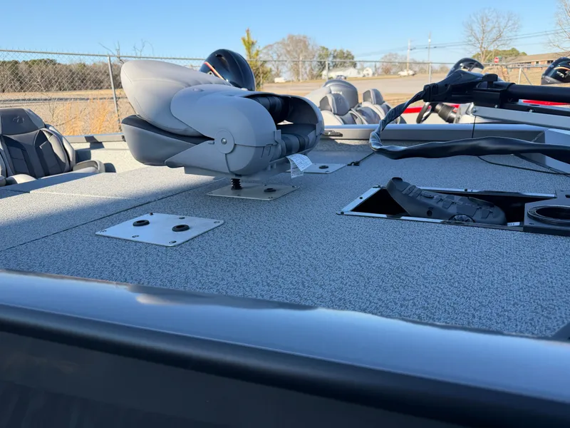 Slide: The Image of 2026 G3 SPORTSMAN 1710 SC boat deck with seat and storage. - 9