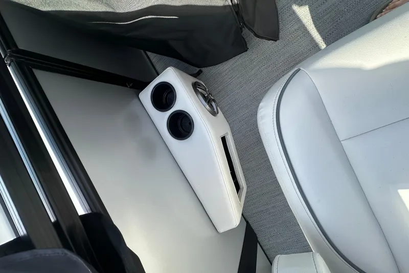 Slide: The Image of Interior of 2026 Godfrey Sweetwater 2286 SFL boat with cup holders and seating. - 14