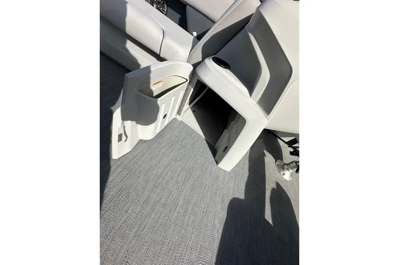 Slide: The Image of Open storage compartment on 2026 Godfrey Sweetwater 2286 SFL boat interior. - 15