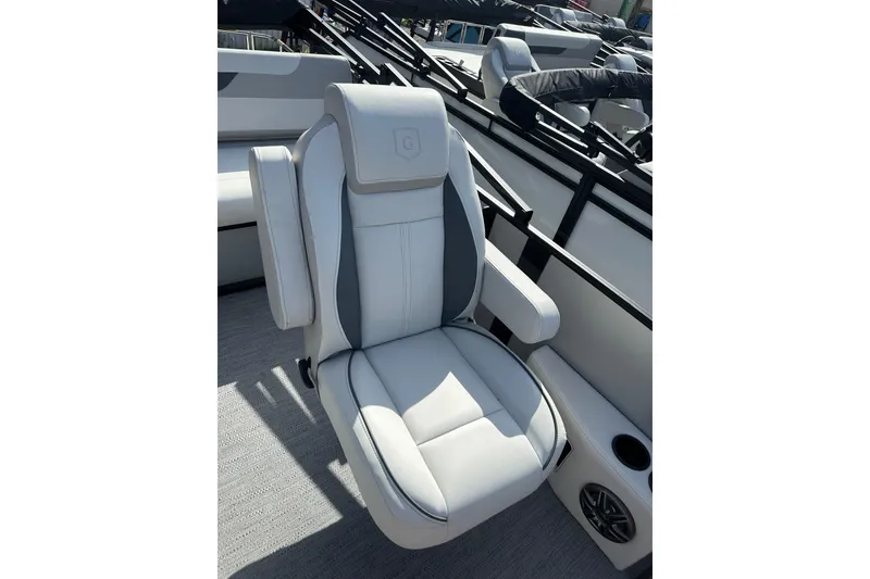 Slide: The Image of Luxurious seating on 2026 Godfrey Sweetwater 2286 SFL boat, featuring plush white upholstery. - 18
