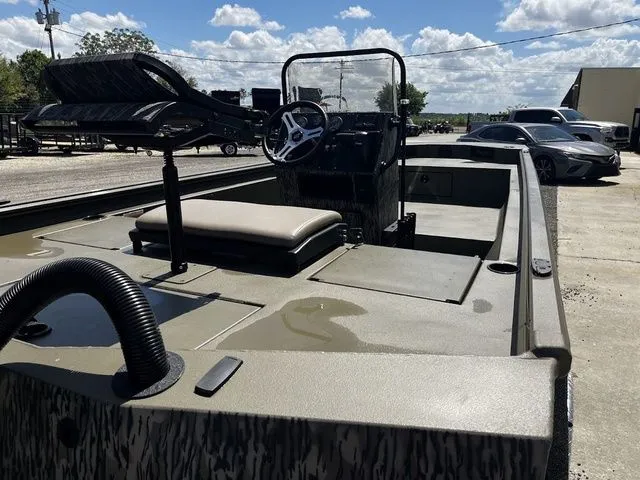 Slide: The Image of 2026 Thor LH1900CC boat with Baystar steering, parked outdoors. - 15