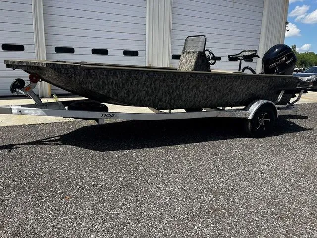 Slide: The Image of 2026 Thor LH1900CC boat with Baystar steering on trailer. - 5