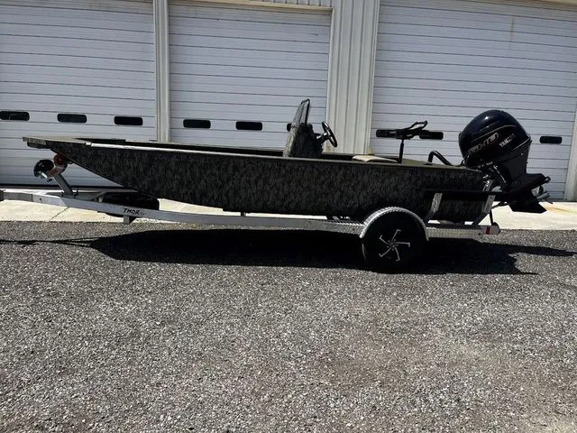 Slide: The Image of 2026 Thor LH1900CC boat with Baystar steering, on trailer. - 6