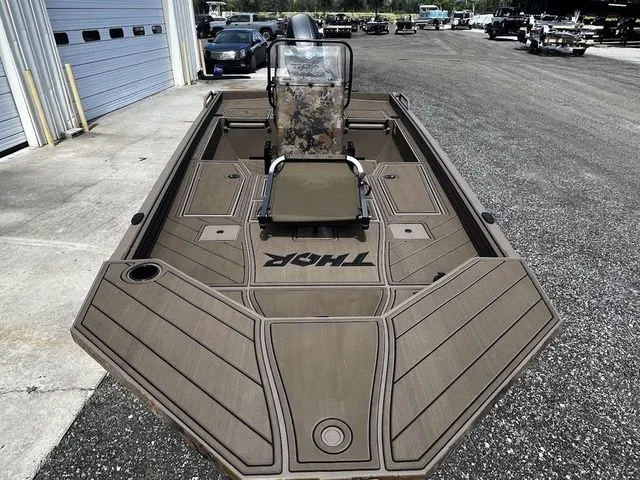 Slide: The Image of 2026 Thor LH1900CC boat with Baystar steering on parking lot. - 10