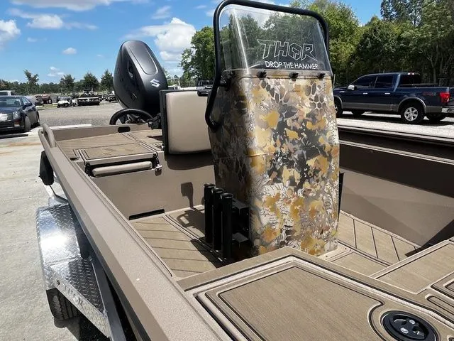 Slide: The Image of 2026 Thor LH1900CC boat with Baystar steering, interior view. - 11