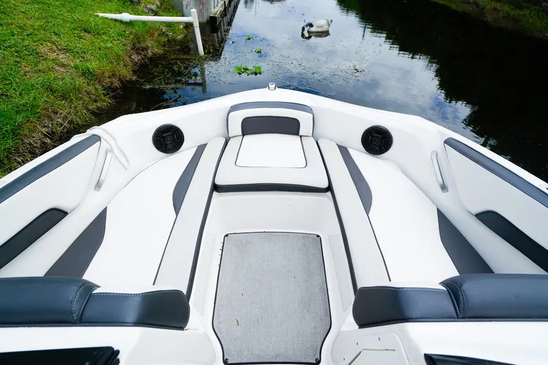 Slide: The Image of 2023 Yamaha Boats SX195 dashboard with steering wheel and controls. - 15