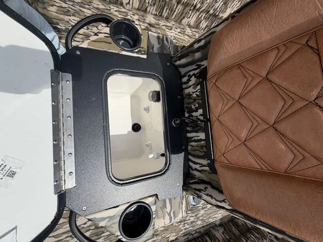 Slide: The Image of Interior of Avid 21 MAG ST boat with brown seat, 2026 model. - 21