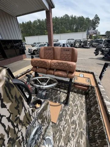 Slide: The Image of Interior view of a 2026 Avid 21 MAG ST boat. - 22