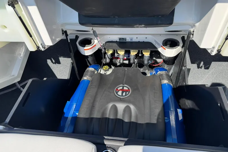 Slide: The Image of 2021 MasterCraft X24 engine compartment with Ilmor engine, showcasing advanced marine engineering. - 13