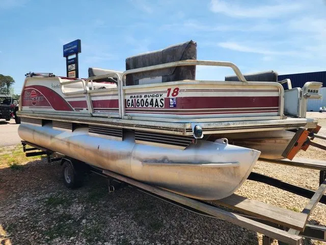Slide: The Image of 1998 Sun Tracker BASS BUGGY 18 pontoon boat on trailer. - 3