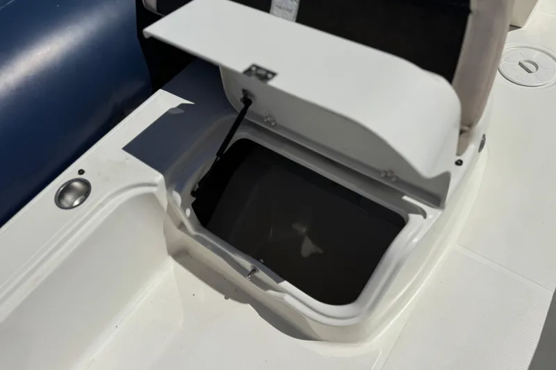 Slide: The Image of Open storage compartment on 2021 Zodiac N-ZO 680 boat deck. - 16