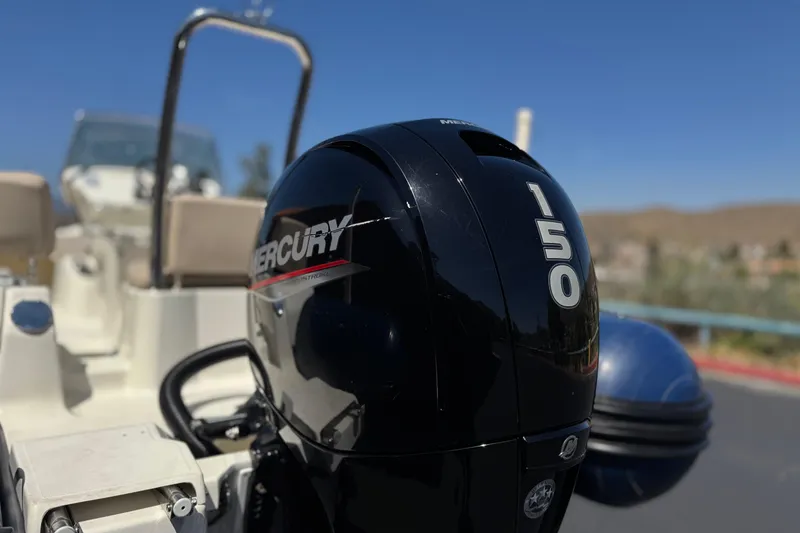 Slide: The Image of Mercury 150 outboard engine on 2021 Zodiac N-ZO 680 boat, sunny day background. - 7