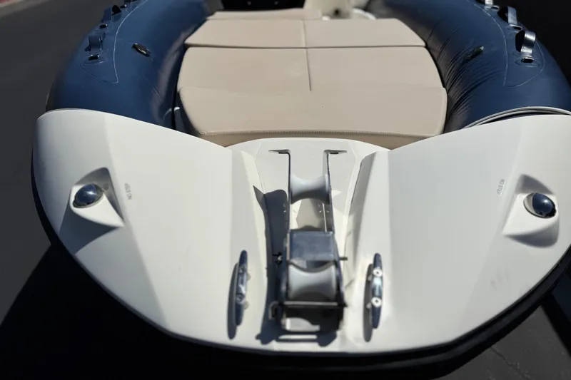 Slide: The Image of 2021 Zodiac N-ZO 680 boat, featuring a sleek bow design and comfortable seating. - 8