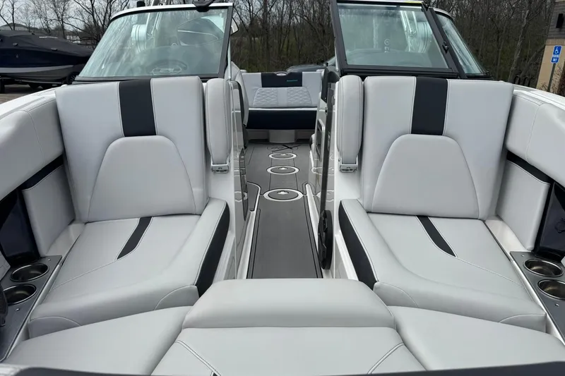 Slide: The Image of 2021 MasterCraft X22 boat interior with luxurious seating and modern design. - 7