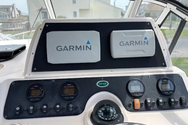 Slide: The Image of Dashboard of 2005 Grady White 282 Sailfish with Garmin navigation displays. - 5