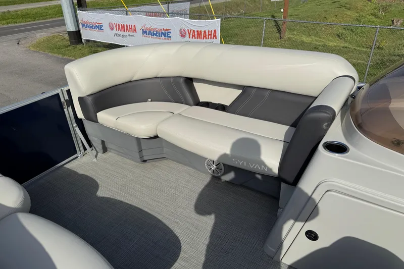 Slide: The Image of 2023 Sylvan Mirage 820 Cruise boat interior with plush seating and modern design. - 10