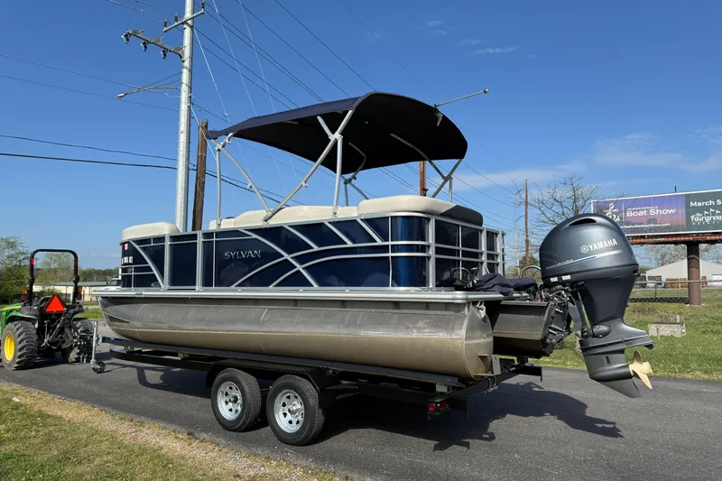 Slide: The Image of 2023 Sylvan Mirage 820 Cruise pontoon boat on trailer with Yamaha outboard motor. - 15