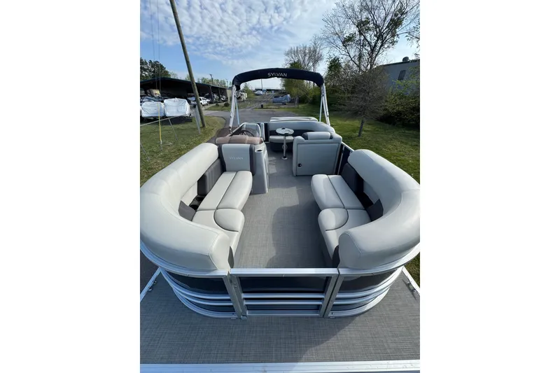 Slide: The Image of 2023 Sylvan Mirage 820 Cruise pontoon boat with spacious seating and canopy. - 6