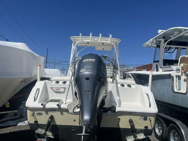 Slide: The Image of 2014 Sea Hunt Victory 225 boat with outboard motor. - 6
