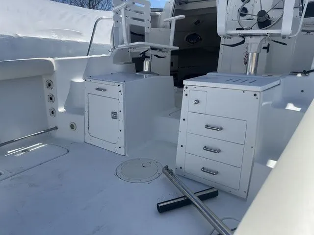 Slide: The Image of Interior of a 2006 Polar 2300 WA boat with seating and storage. - 3