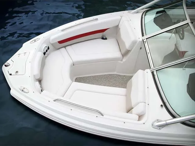 The Image of Chaparral 216 SSi 2011 boat with white interior on water. - 1