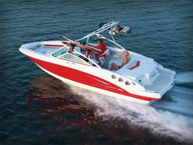 Slide: The Image of 2011 Chaparral 216 SSi boat on water, red and white design. - 14
