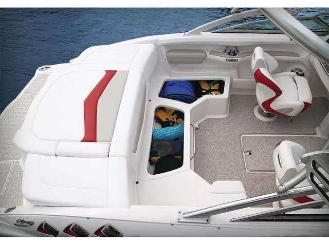 Slide: The Image of Interior of 2011 Chaparral 216 SSi boat with seating and storage compartments. - 5
