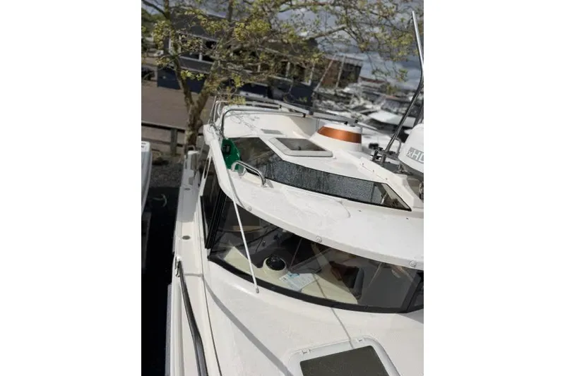 Slide: The Image of 2020 Ranger Tugs R-23 boat docked, showcasing sleek design and modern features. - 15