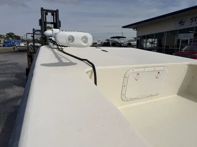 Slide: The Image of Jones Brothers 22 Light Tackle Edition boat, 2005 model, on a parking lot. - 6