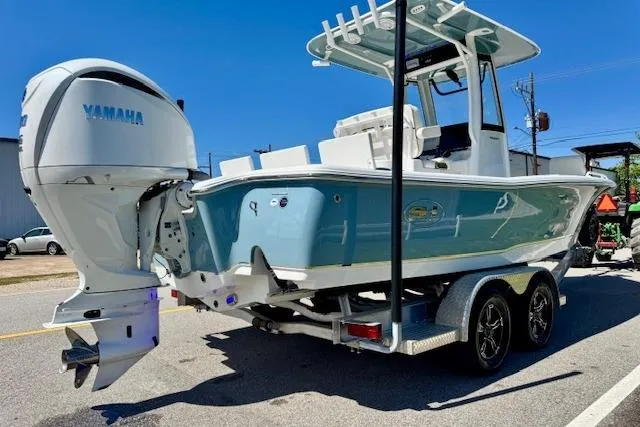 Slide: The Image of 2022 Sea Hunt BX 25 FS boat on trailer with Yamaha outboard motor. - 4