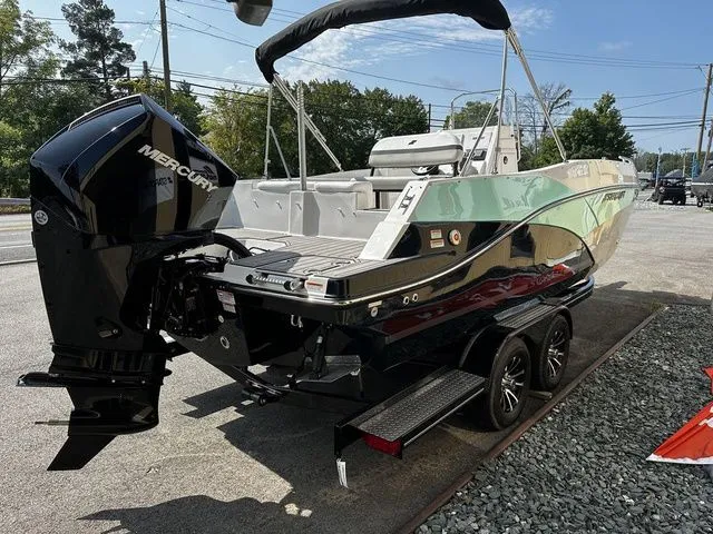Slide: The Image of 2024 Starcraft SVX 231 OB boat with 250hp engine and trailer. - 11