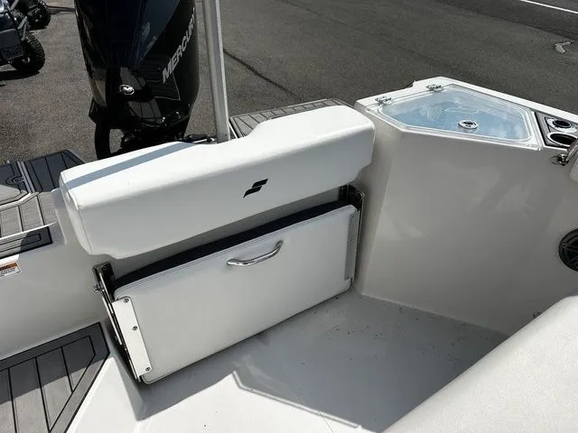 Slide: The Image of Interior of a 2024 Starcraft SVX 231 OB boat with seating. - 22
