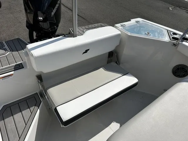 Slide: The Image of 2024 Starcraft SVX 231 OB boat seat and engine view. - 23