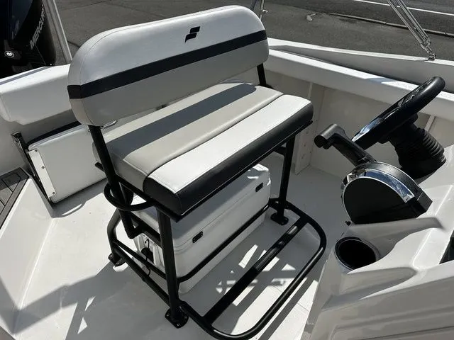 Slide: The Image of Starcraft SVX 231 OB boat seat and controls, 2024 model. - 26