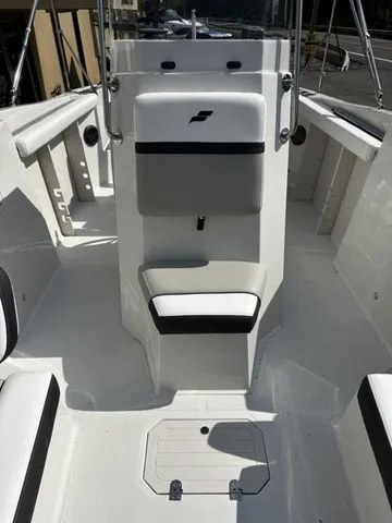 Slide: The Image of 2024 Starcraft SVX 231 OB boat interior with seating area. - 35