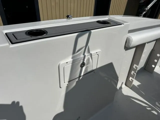 Slide: The Image of Interior view of 2024 Starcraft SVX 231 OB boat with cup holders. - 38