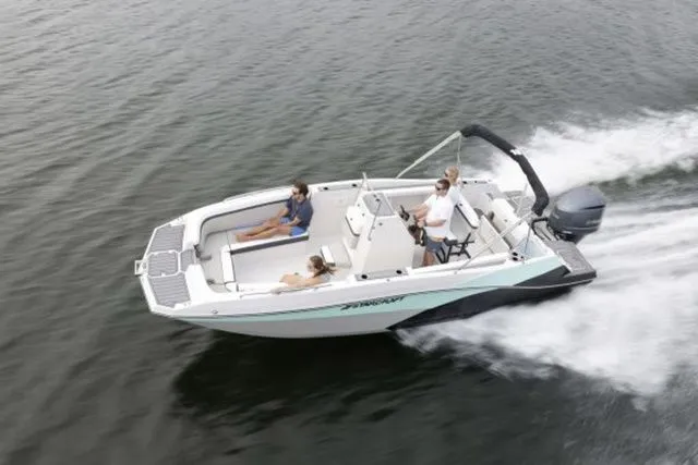 Slide: The Image of 2024 Starcraft SVX 231 OB boat on water, 250hp, with trailer. - 6