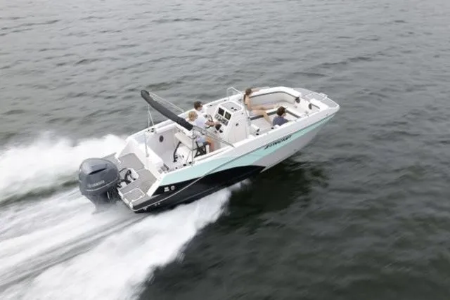 Slide: The Image of 2024 Starcraft SVX 231 OB boat cruising on water. - 9