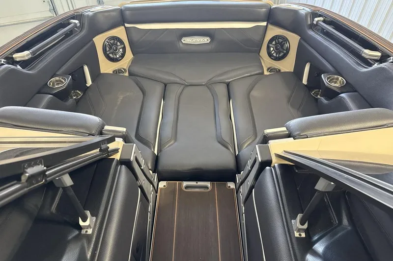 Slide: The Image of Interior of 2023 Supra SE 550 boat with luxurious seating and modern design. - 11