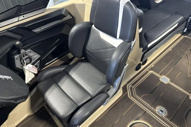 Slide: The Image of 2023 Supra SE 550 interior with black leather seating and modern dashboard design. - 13