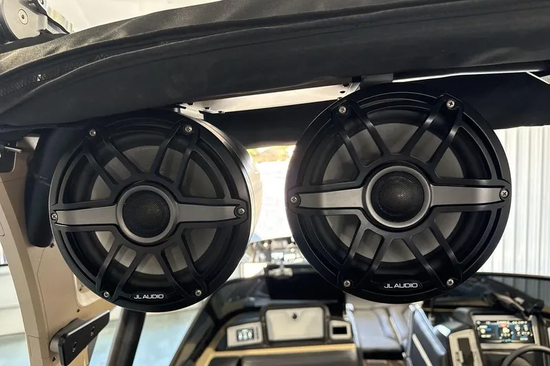 Slide: The Image of JL Audio speakers in a 2023 Supra SE 550 boat, enhancing sound quality. - 21